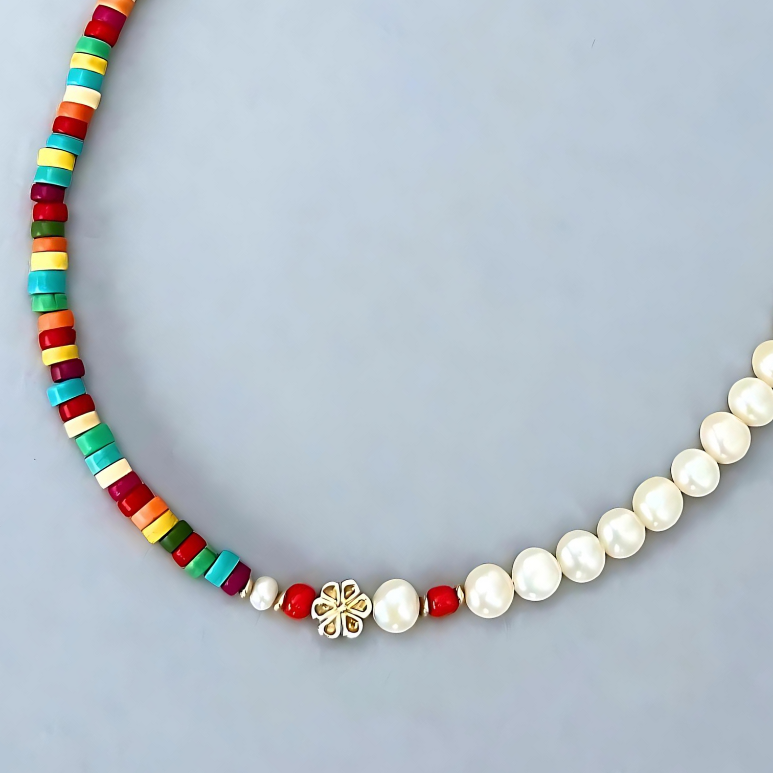 Detailed shot of this trendy Le BijouBijou Happy Necklace is made with pearls and coloured howlite discs.
