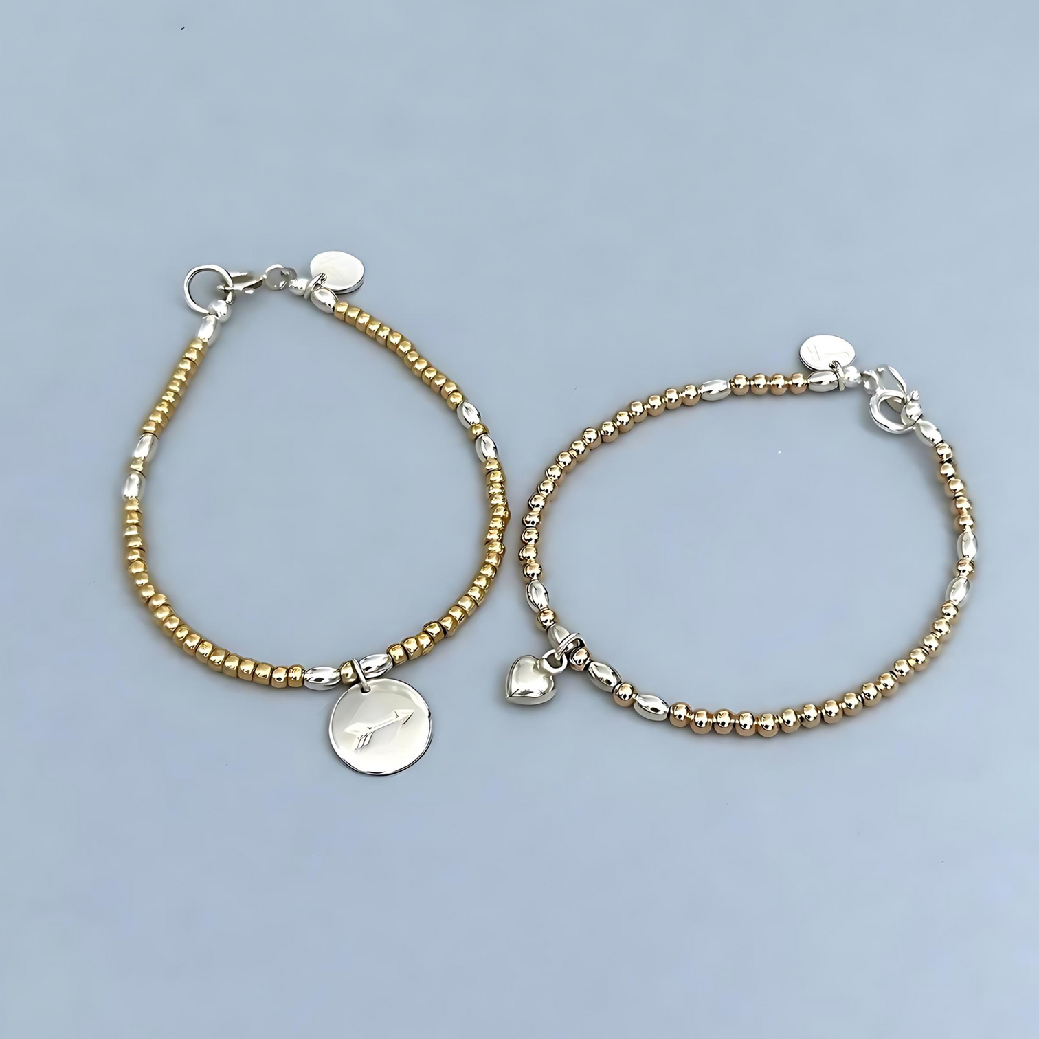 The LeBijouBijou Streak of Gold Duo Bracelets made with yellow, pink and sterling silver. 