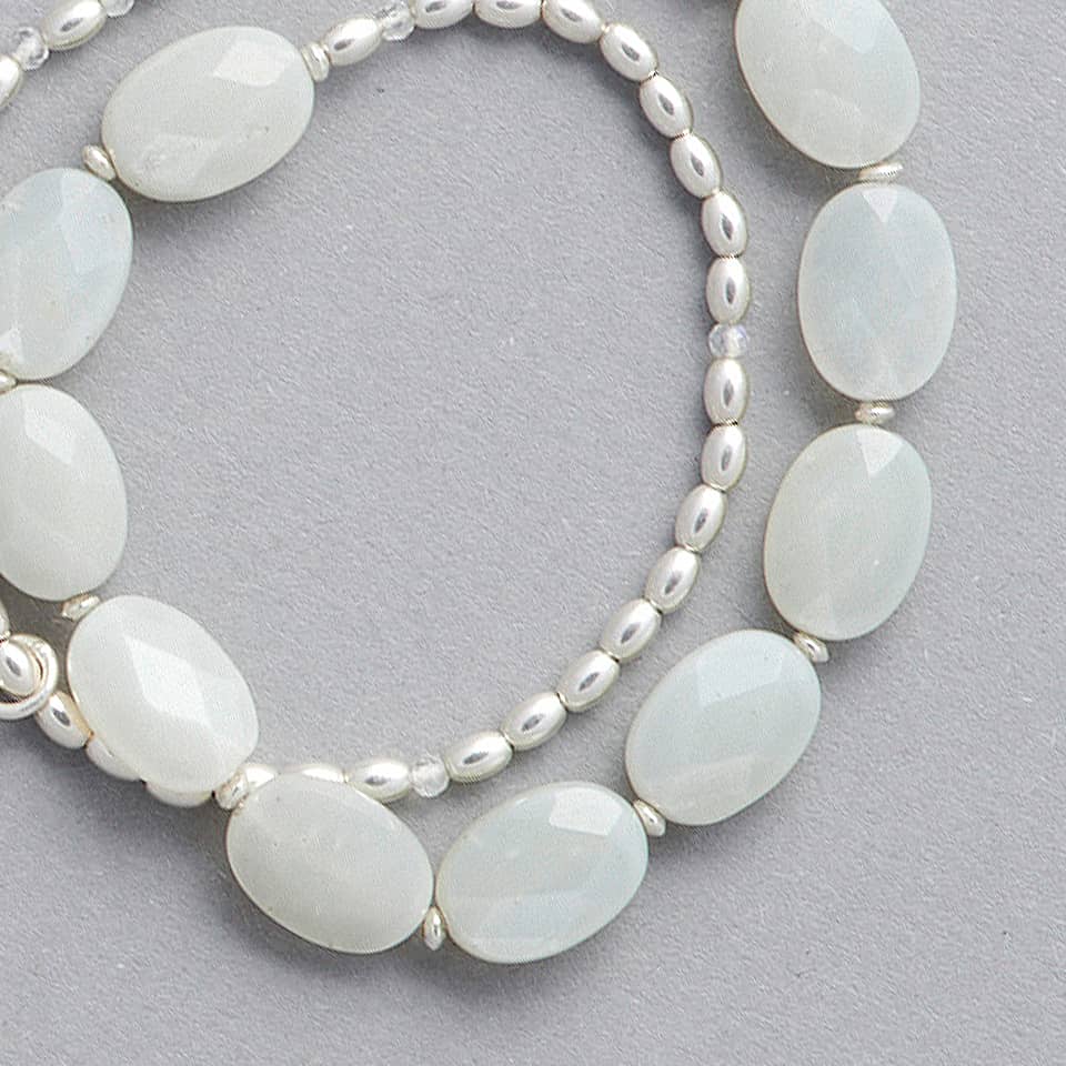 The LE BIJOUBIJOU ALINA Double Wrap Bracelet product close-up. This bracelet is made with faceted Olive-Shaped Moonstone and Sterling Silver.