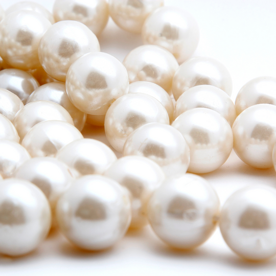 To introduce this blog on how to care for your pearls, we have opted to show pearls resting on a table that have not yet been mounted 
