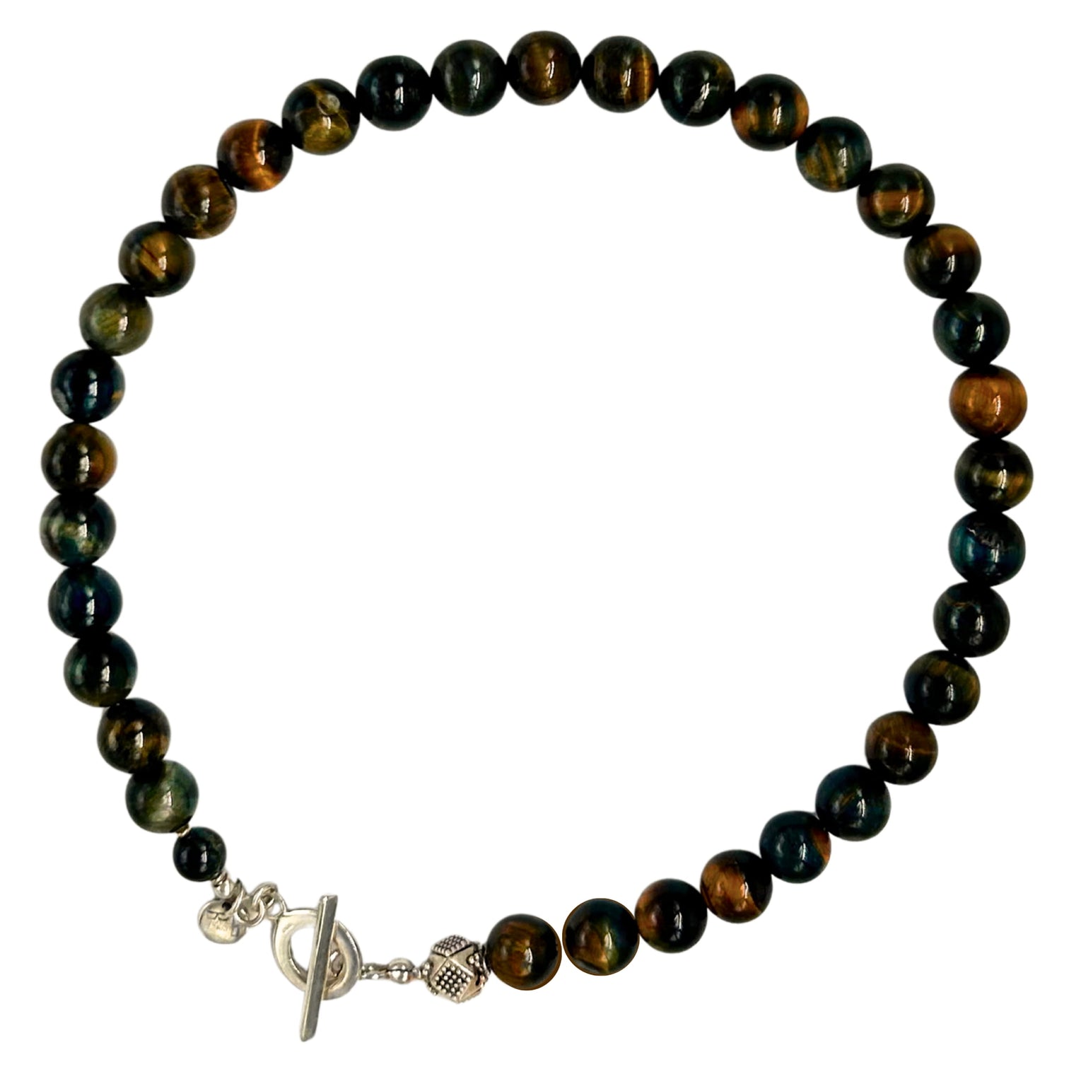 Amber Flash Necklace with round Tiger Eye beads and  an accent of a beautifully crafted silver bead next to a silver toggle clasp on clean pale grey background - Le Bijou Bijou” 