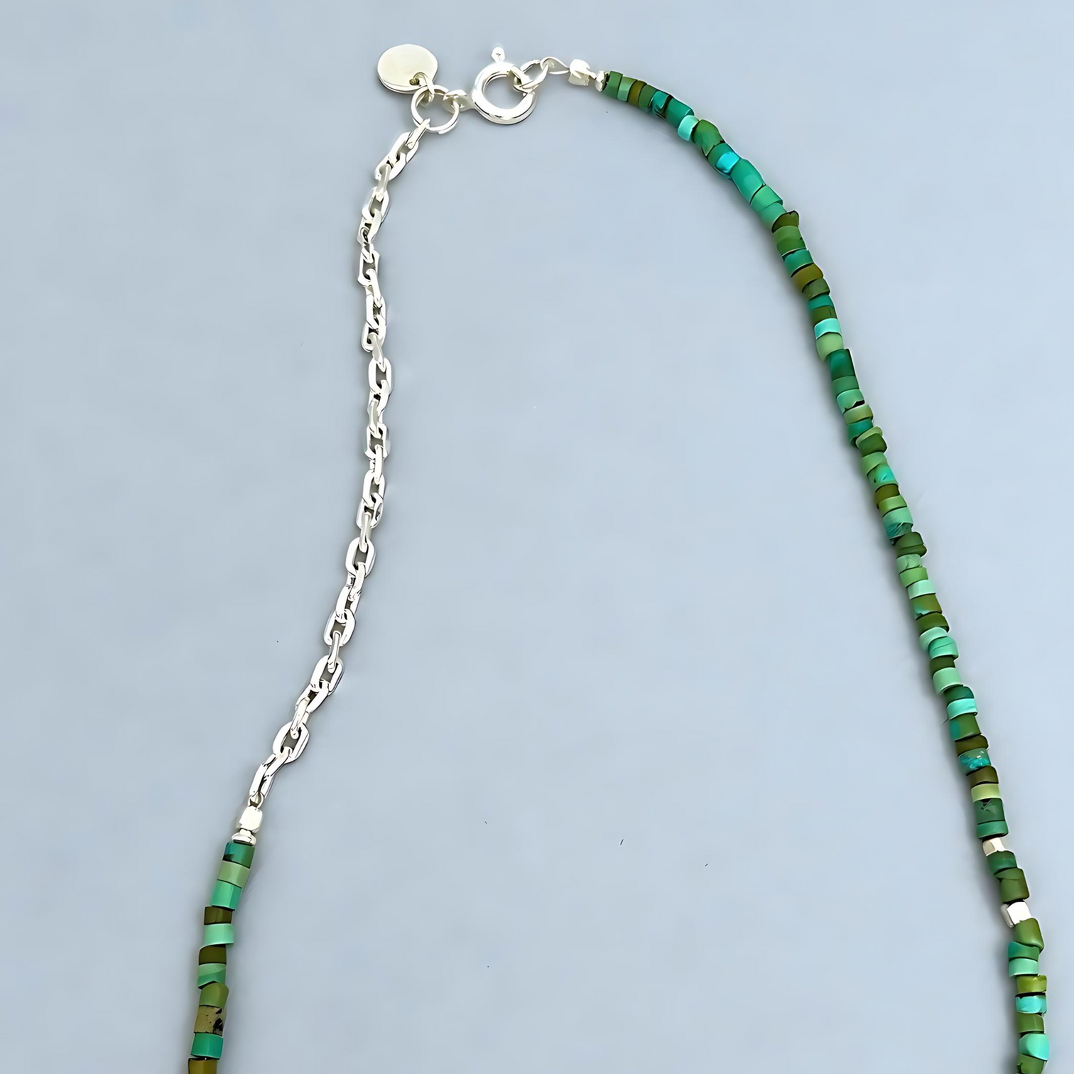 Trendy Necklace, Turquoise and a silver Chain. Detail shot of silver chain.