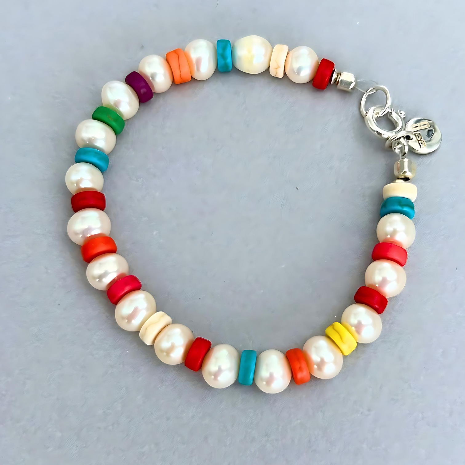 A grown-up version of the candy bracelets made with cultured white pearls and colourful howlite discs. The Le BijouBijou Candy Bracelet.