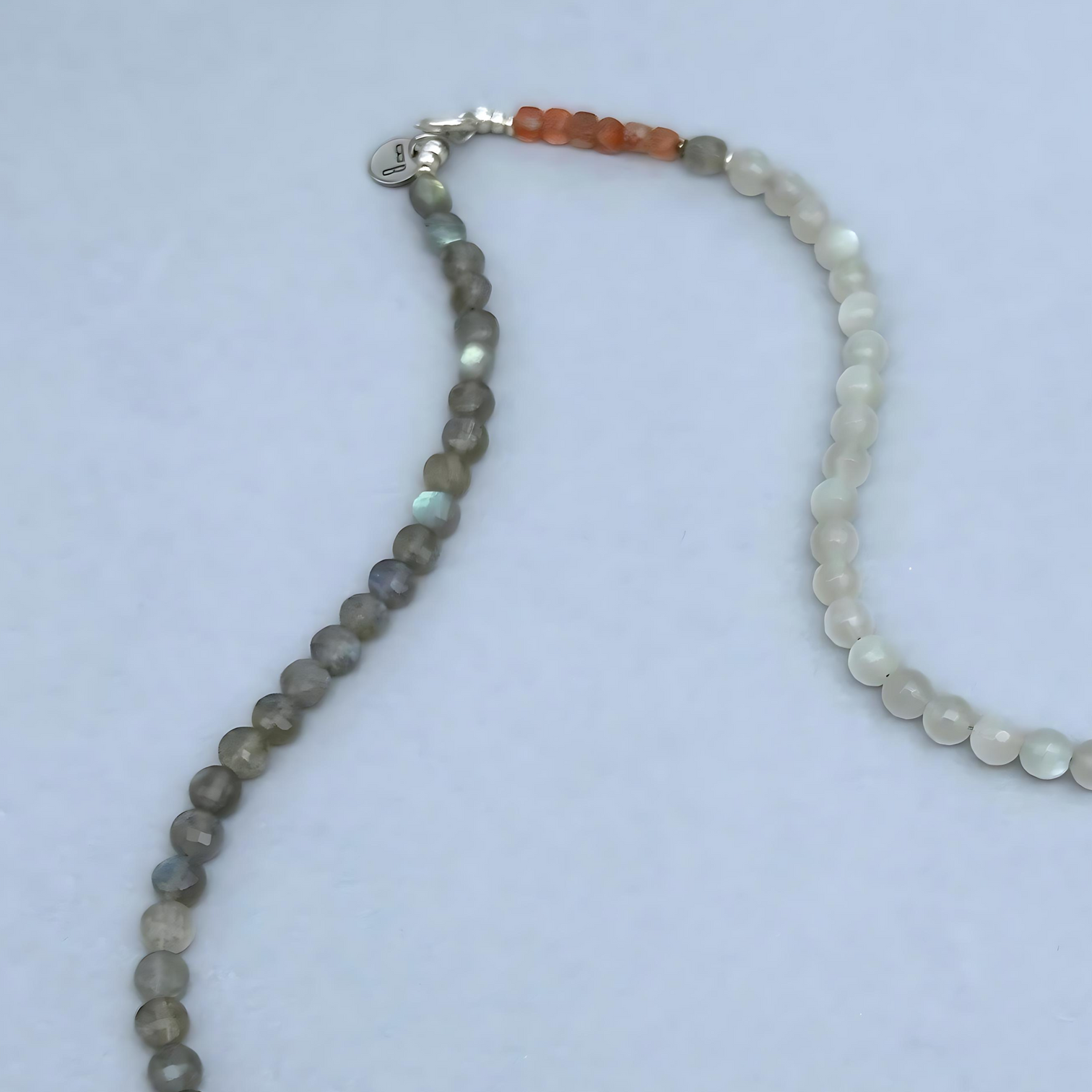 The soft feminine energy of Moonstones combined with the joyful vibes of Sunstone and the motivating powers of Labradorite gives this necklace a unique aura. 