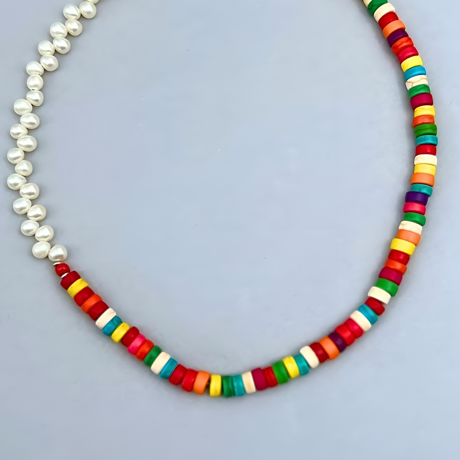 The trendy Le BijouBijou Rainbow Necklace made with Pearls and multicolored Howlite Discs. Detail shot