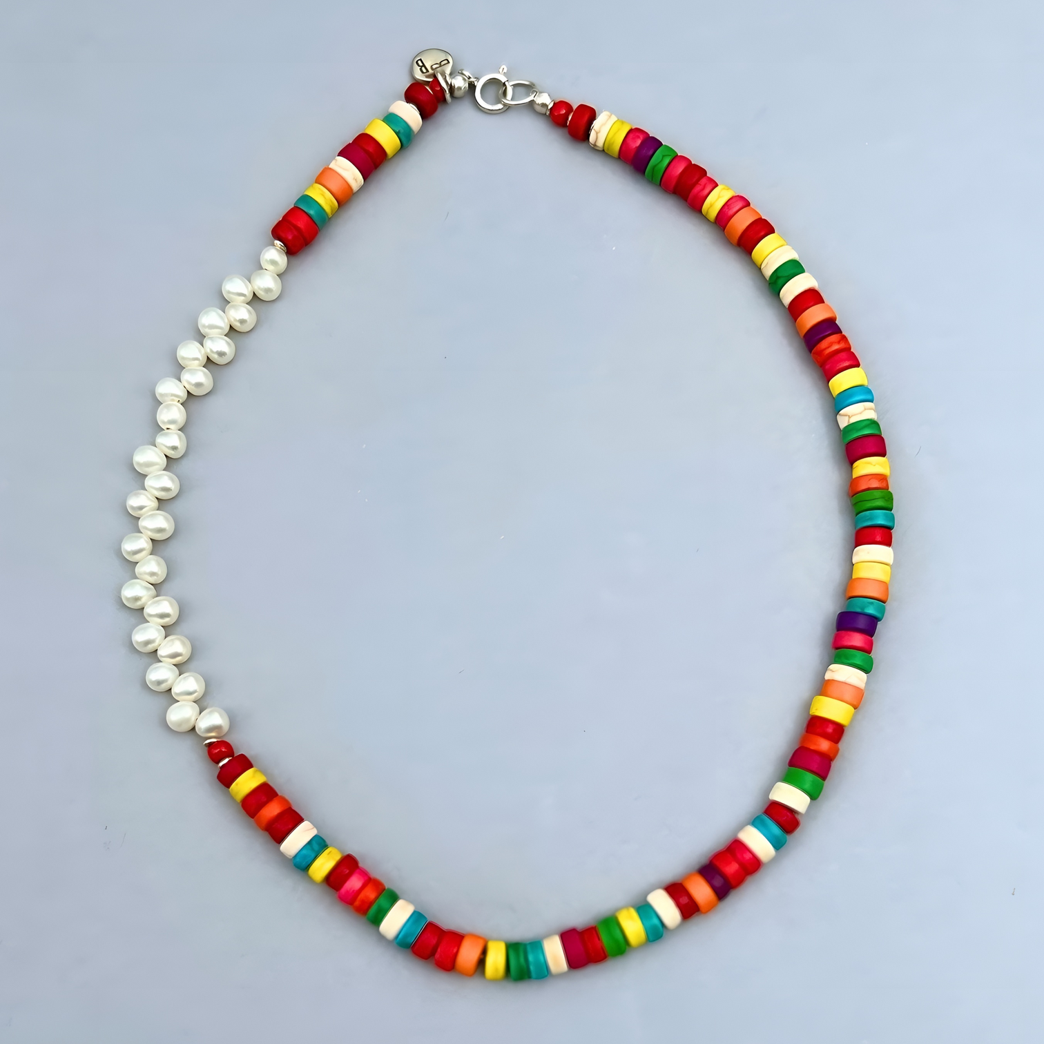 The trendy Le BijouBijou Rainbow Necklace made with Pearls and multicolored Howlite Discs.