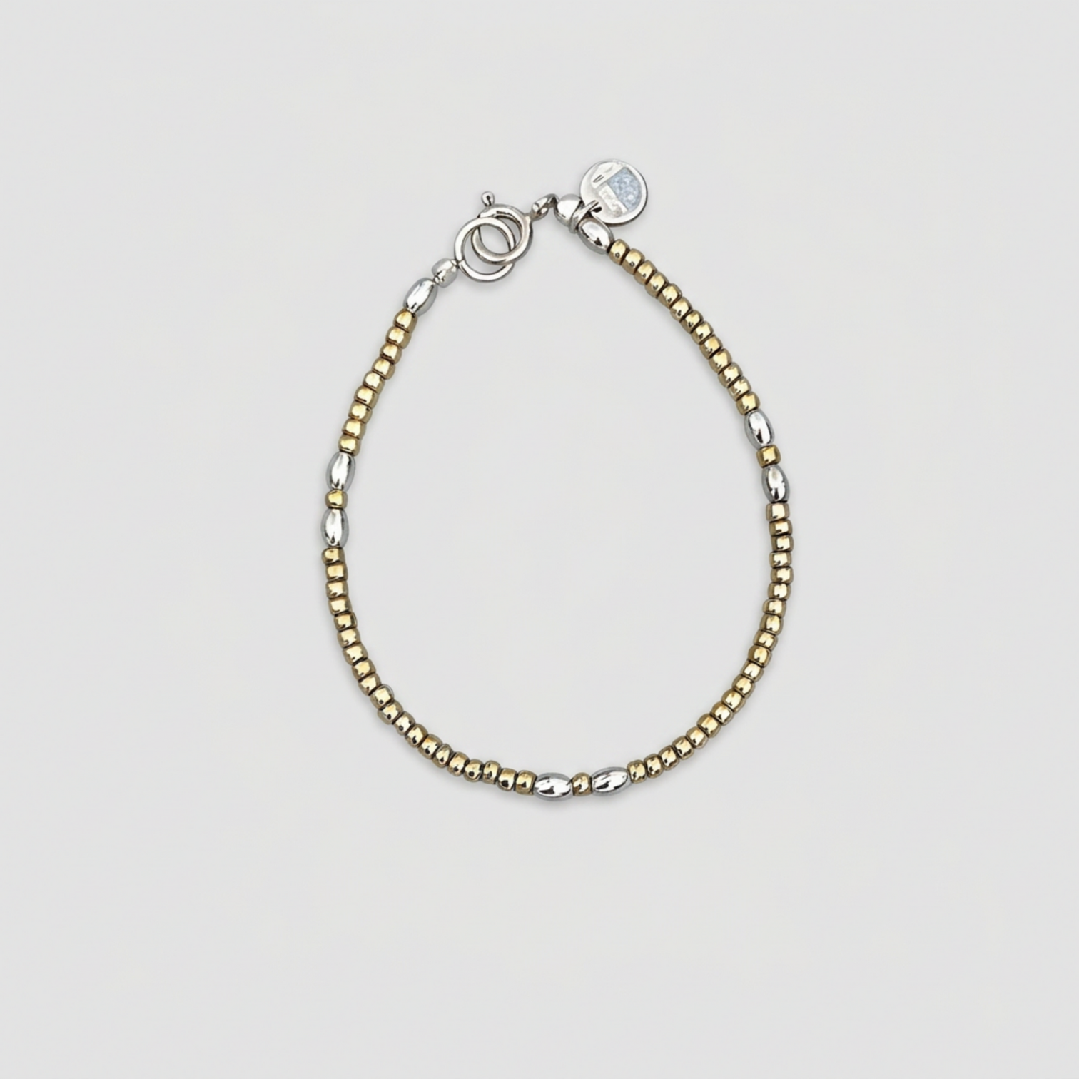 STREAK OF GOLD BRACELET 01 neutral grey background