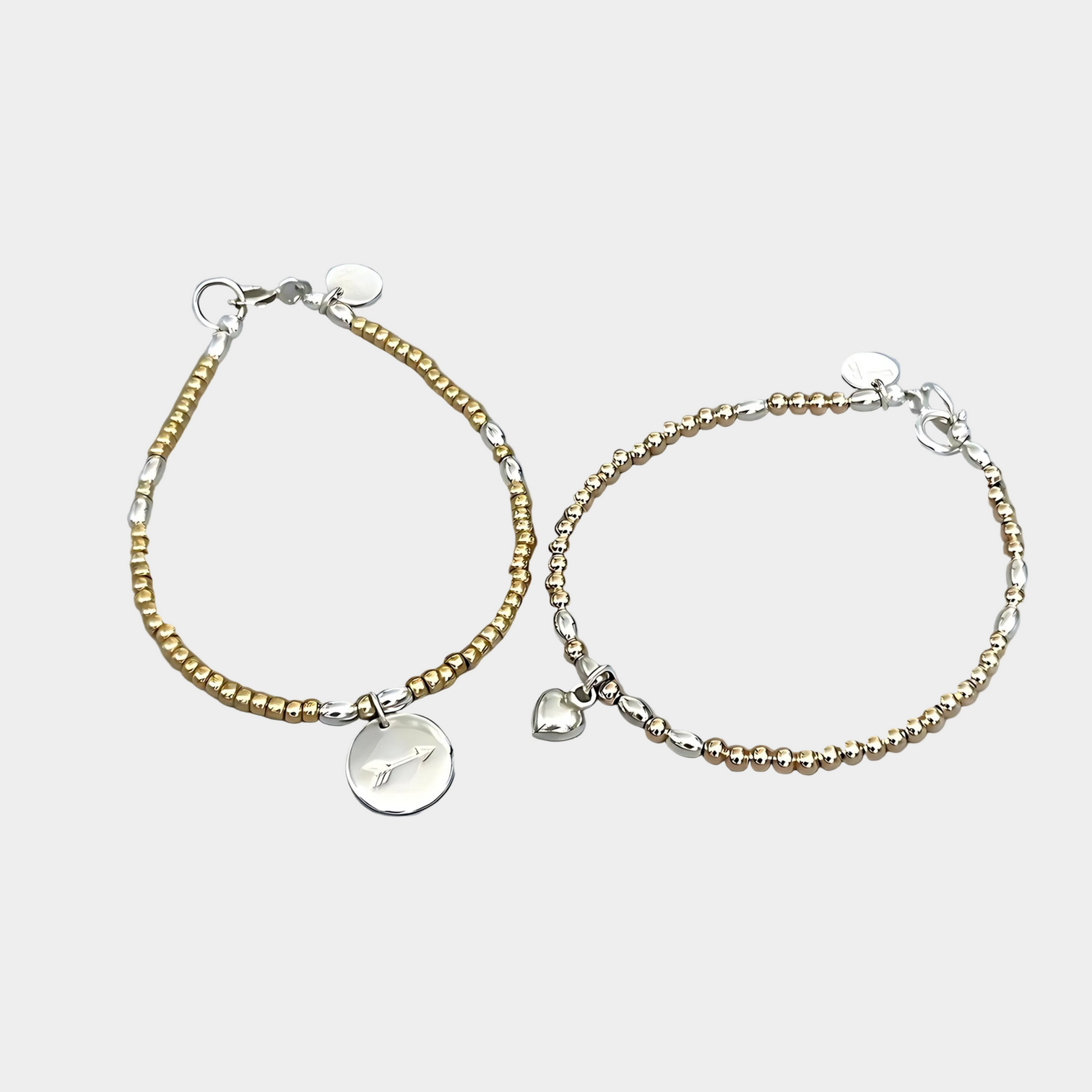 The LeBijouBijou Streak of Gold Duo Bracelets made with yellow, pink and sterling silver. 