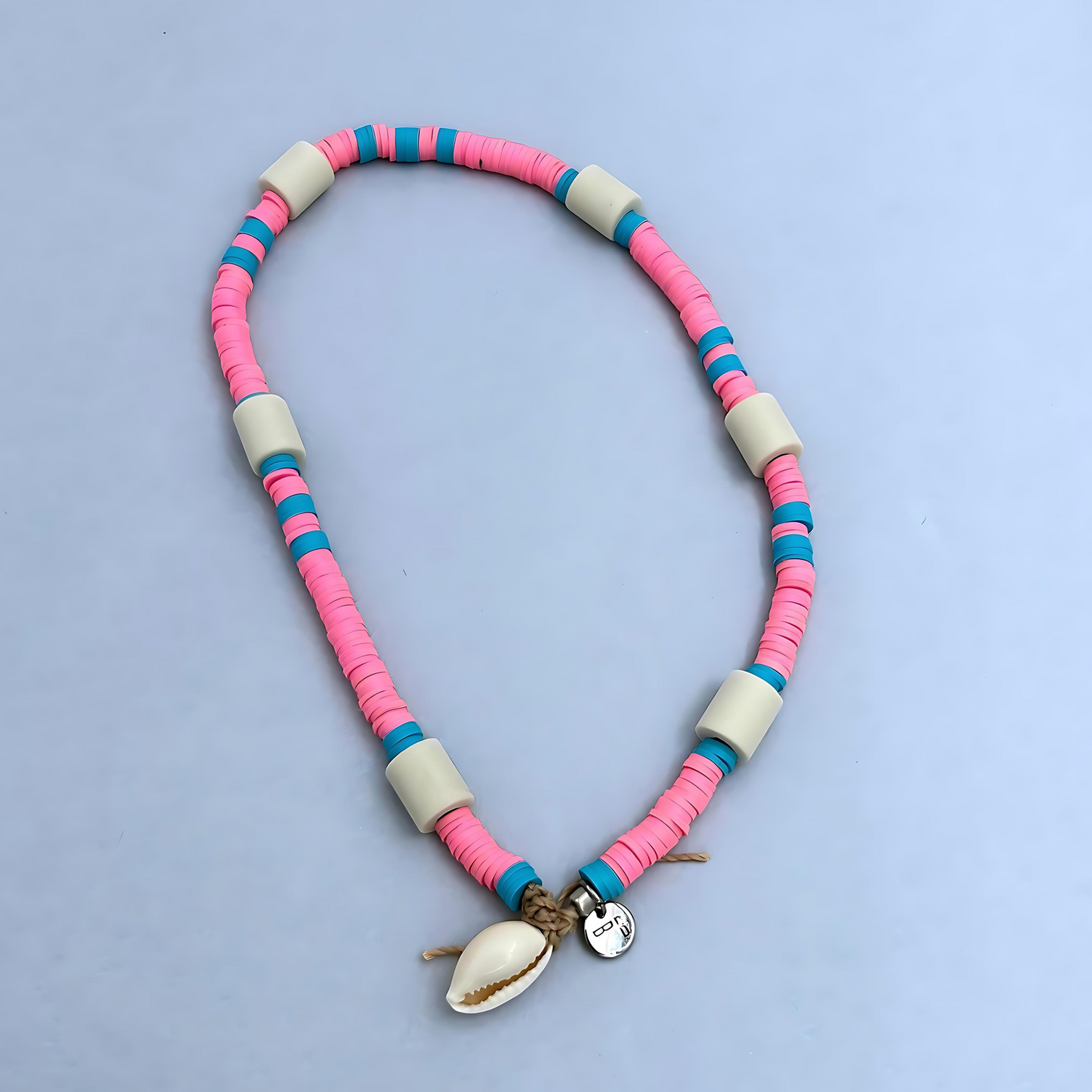 The cool surfer's look anti-tick dog necklace in a bubblegum pink colour.