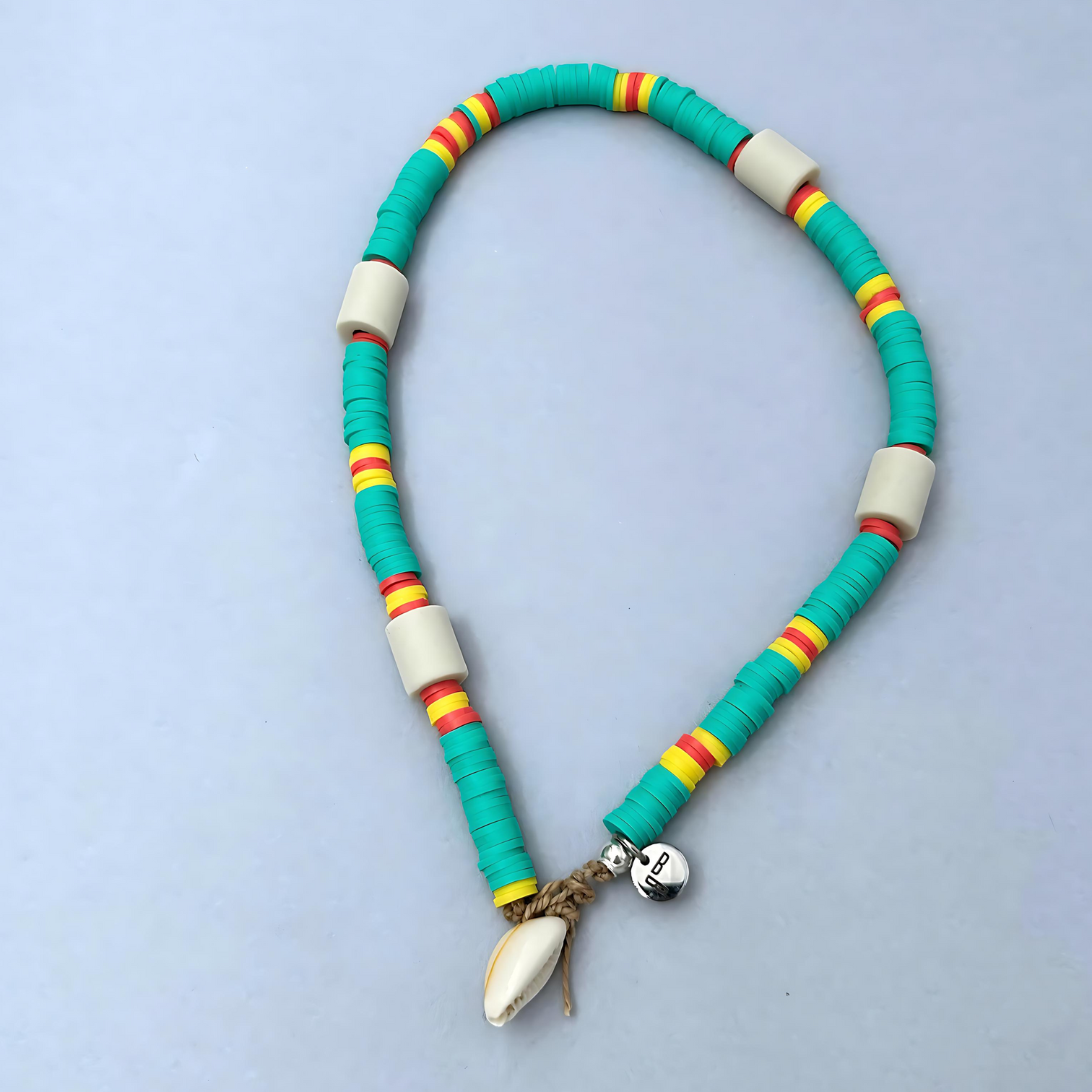 The cool surfer's look anti-tick dog necklace in Caribbean Green 