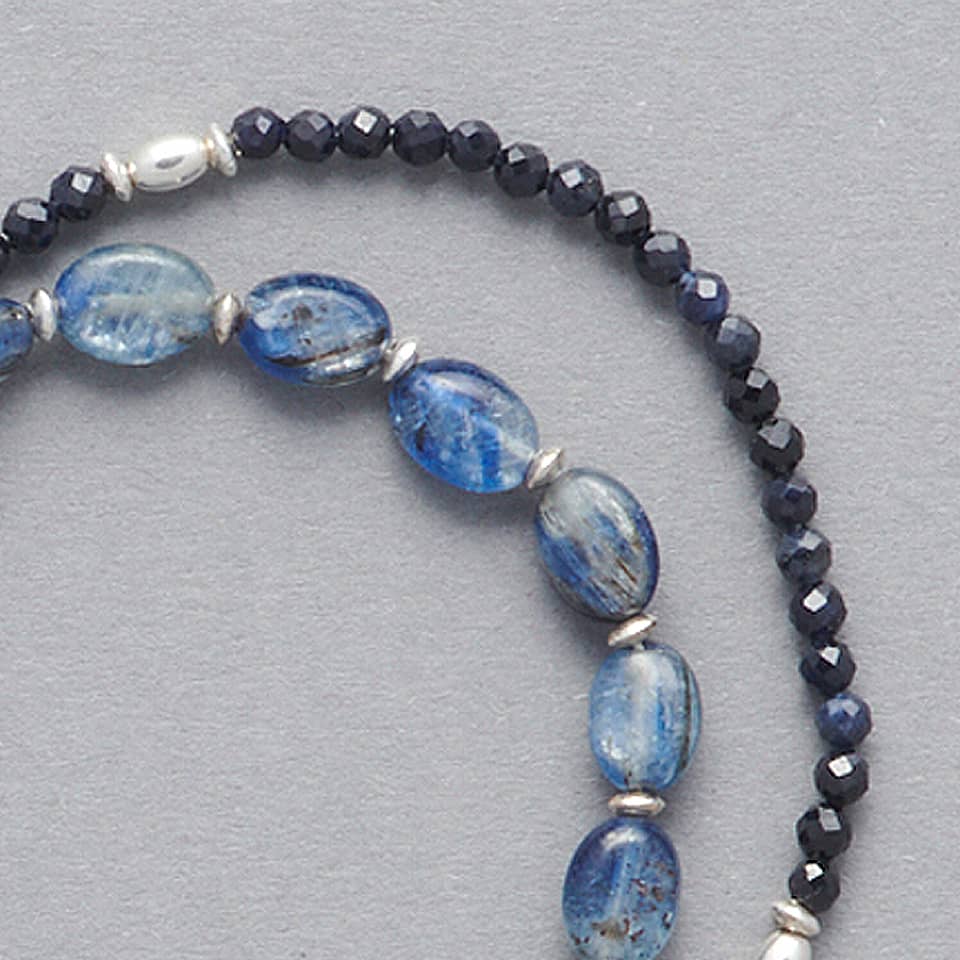 Close-Up of the CIEL Double Wrap Bracelet made with oval-shaped Kyanite, faceted Sapphires and Sterling Silver.  