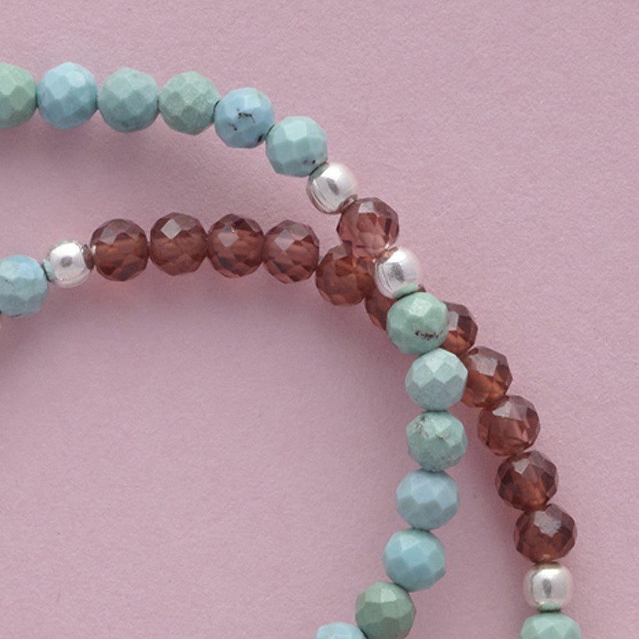 Close-up of the My Sia and Kya AND SIA Junior Girls Bracelets. Made with faceted Garnets, faceted Turquoises and Sterling Silver.