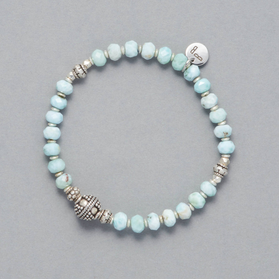 Product Shot of the Delphine Bracelet, strung with faceted Larimar and beautiful sterling silver elements.