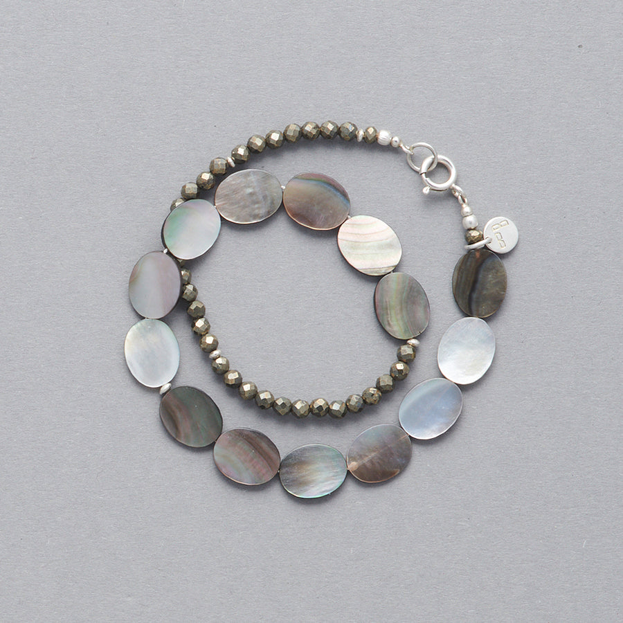 Product picture of the ELEA Double Wrap Bracelet made with Mother of Pearl and Pyrite. 