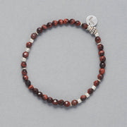 Product shot of the Kim Bracelet made with faceted red Tiger Eye and Sterling Silver Beads and Element. 