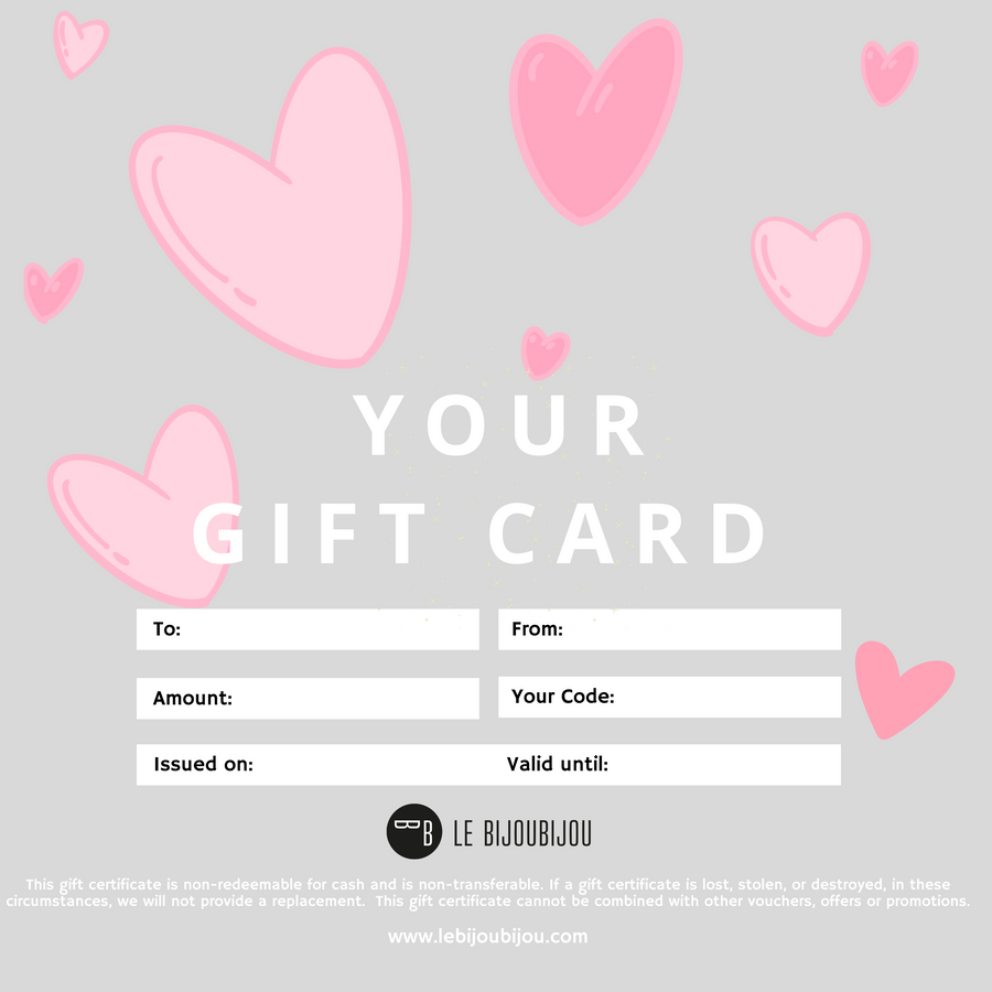 The Le BijouBijou Gift Certificate Hearts is a gift card with various illustraded pink heaerts in a pale grey backgroung. The  perfect gift for that special someone. 