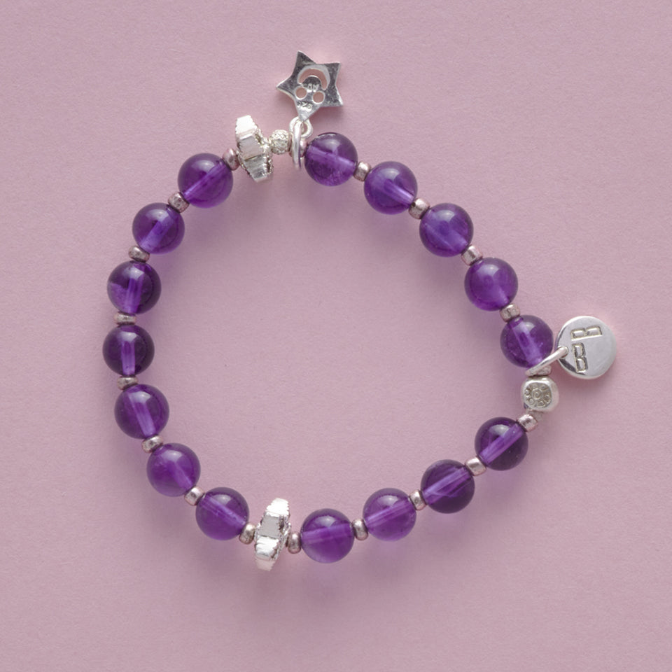 Product Shot of the Lucky Star Le BijouBijou Bracelet for girls. Made with round Amethyst and Sterling Silver stars.