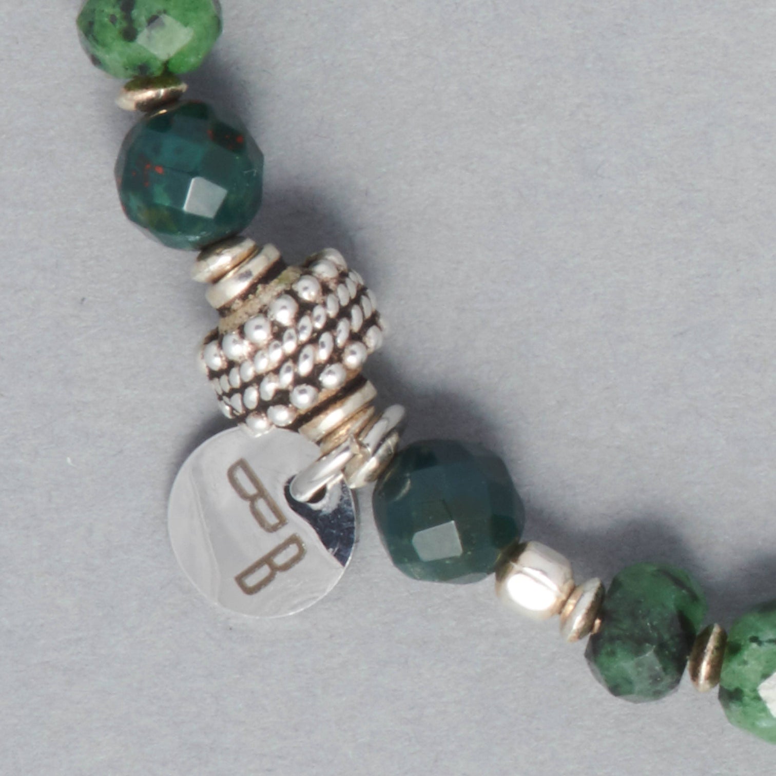 Detail shot of the Robin Bracelet made with Rubin Zoisite, Heliotrope and Sterling Silver Elements. 