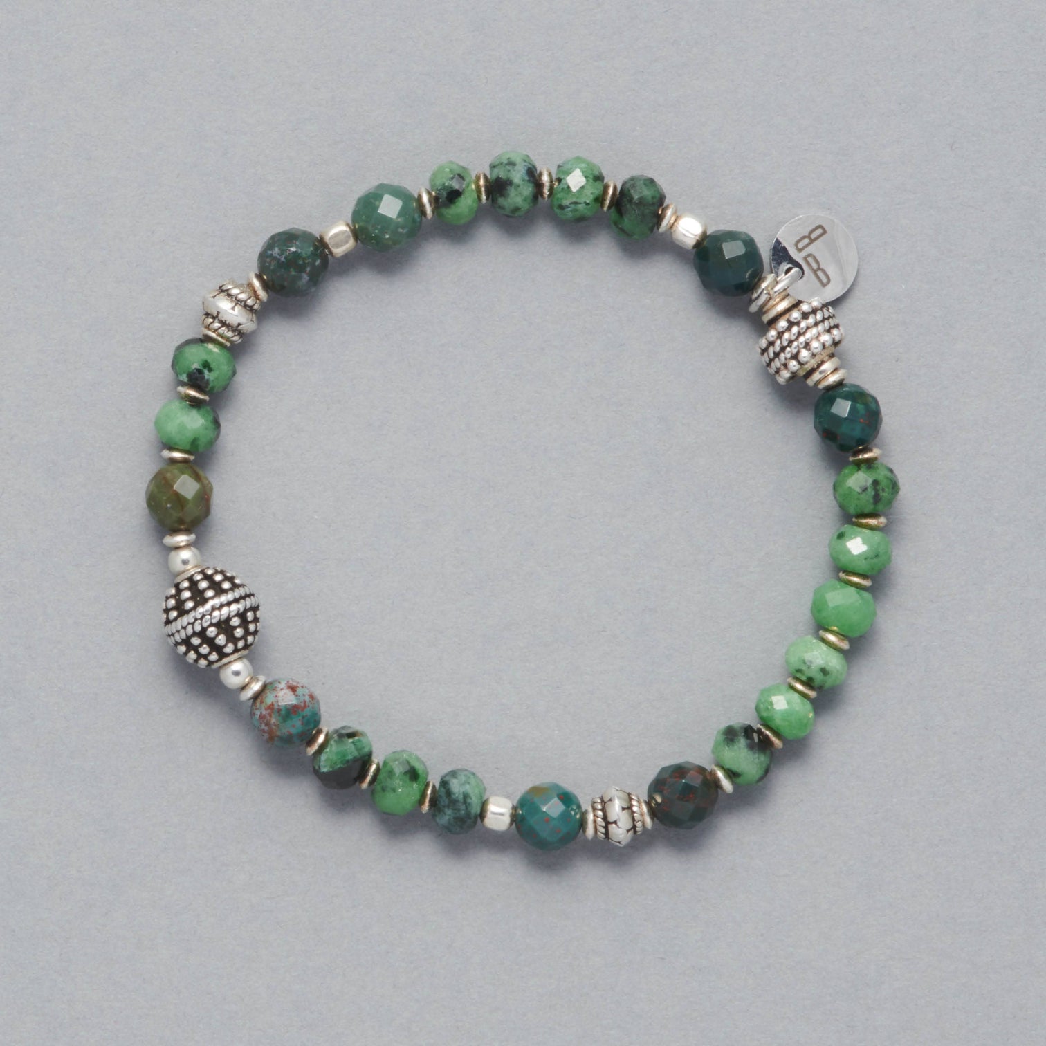 Product shot of the Robin Bracelet made with Rubin Zoisite, Heliotrope and Sterling Silver Elements. 