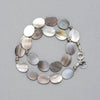 Product shot of the Stella Bracelet made with Mother of Pearl, Pyrite and Sterling Silver Elements. 